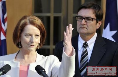 吉拉德和气候变化部长甘比德